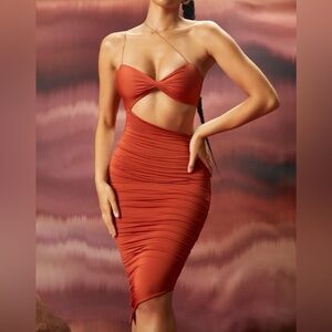Oh Polly Entwined Twist Bust Cut Out
Asymmetrical Ruched Dress in Rust Size 8